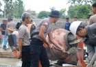 Gotong-Royong-Bersama-Satgas-Ops-Damai-Cartenz,-Warga-Mimika-Rasakan-Manfaat-Akses-Pemakaman-yang-Lebih-Baik